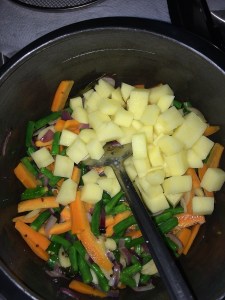 And in goes the potato.