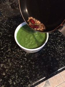 Add the tempering to the ground chutney.