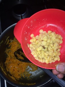 After the carrots get cooked add the 3/4th boiled toor dal and mix.