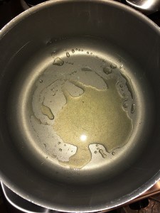 Add oil in a vessel.