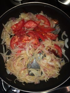 Next goes the tomatoes.