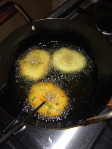Now the first vada is cooked on top so flip it over on the other side tocook them evenly.