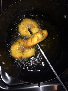 Remove the vada from the oil after it becomes golden brown.