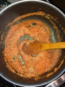 Cook until you see the oil ooze out. The oil is shinning and thats when u switch the stove off.