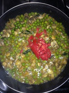 Add tomatoes along with it and continue to cook them.