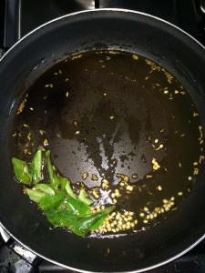 Add a spring of curry leaves.