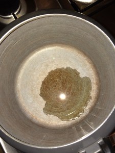 Add little oil in a pressure cooker.