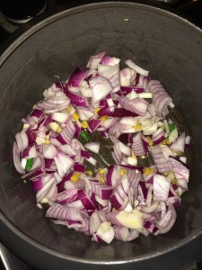 After that add the rough chopped onions.