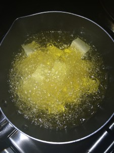 Deep fry the tofu until slightly brown.