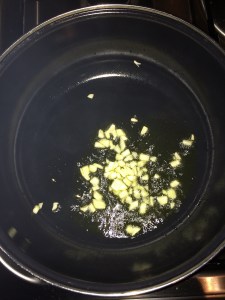 Add the chopped garlic. 