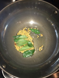 Now goes the curry leaves.