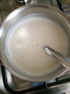 Ok the milk is boiled and now reduce the flame to low.