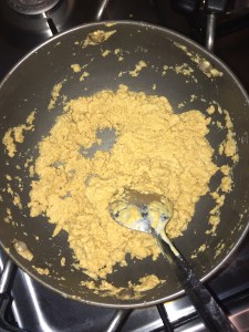 Keep stirring until there is roasted aroma in the air and the color of the atta becomes golden brown. 