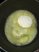 Take a pan and add butter and allow it to melt ina low flame and then add the flour to it.