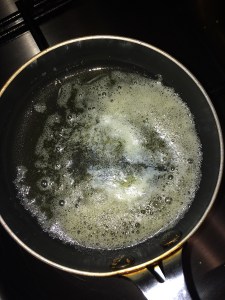 Take little oil and butter in a pan for the tadka.