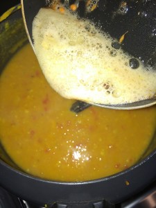 Transfer the tadka on the sambar.