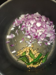 Now add the chopped green chilies and the onion and saute for few mins.