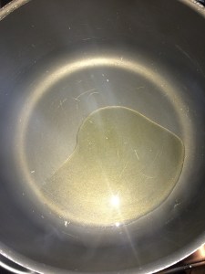 Take little more oil in a vessel.