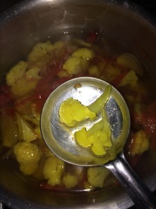 After sometime check if the cauliflower is cooked.