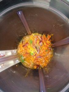 After the mixture gets cooled transfer the contents to a blender along with little water.