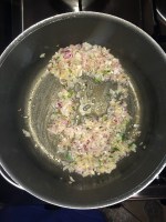 Add the chopped green chili and onion and fry till translucent.