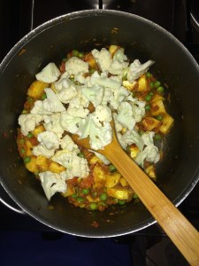 After that add the chopped cauliflower.