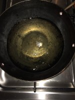 Heat oil in a vessel for deep frying the vada's.