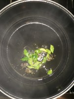 Temper mustard and curry leaves.