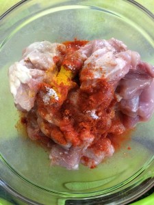 Marinate the chicken with Turmeric, Red chili pdr., Vinegar and Salt.