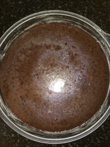 Now transfer the batter into the prepared pan and bake it in the oven for atleast 25 to 30 mins until the skewer inserted comes out clean.