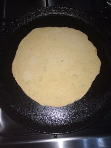 Heat a tawa and put the rolled chapathi on medium flame.