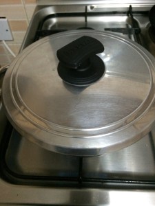 Cover and cook in medium flame until oil oozes out.