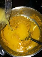 Add the water to the cooked paste.