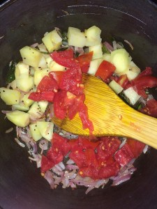 Now add the chopped tomatoes.