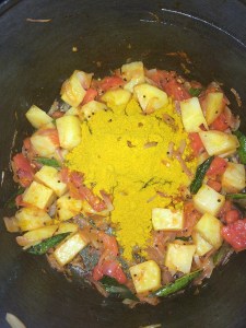 After that add the coriander powder.