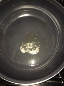 Now take oil in a pan and temper mustard. 