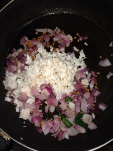Now add the grated coconut and fry till a nice aroma comes from the coconut.