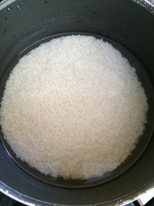 Soak rice for half an hour in lukewarm water.