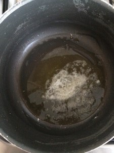 Take oil and ghee in a vessel.