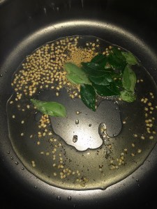 Now goes the curry leaves.