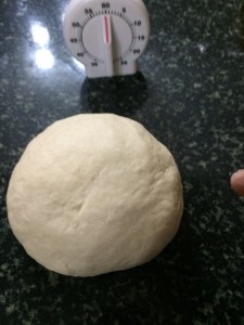 The dough should be non sticky. If it is sticky then add little flour and knead it until you get a smooth non sticky dough.