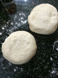 I took one portion of the Pizza Dough I made.