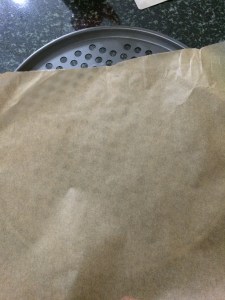 Cut parchment paper according to the size of the pan.