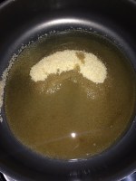 Take sugar and water in a wide mouthed non stick pan and set it in a high flame.