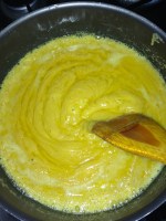 Everything will froth. reduce the flame to low.