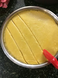 Cut them when it is warm itself. either squares or diamonds.