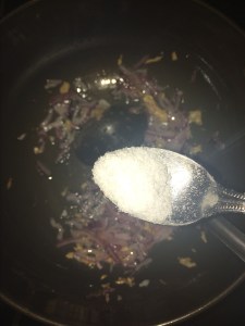 Add salt to it and cook the onions well.