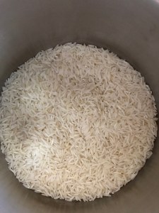 Measure rice in a bowl.