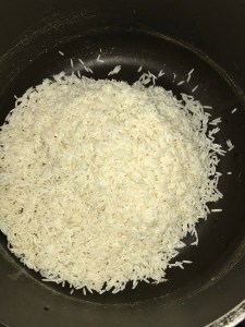 Add the drained rice.