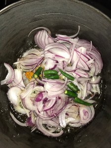 Next add green chilies.